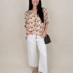 Kace Floral Boho Blouse in cream botanical print with embroidered yoke and smocked ruffle sleeves — Paper Doll

