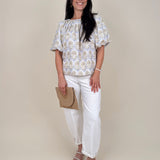 Palm Breeze Blouse in cream with olive and lavender palm tree print and puff sleeves — Paper Doll