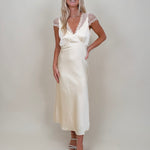 Isadora Satin Midi Dress in light yellow with lace trim and mesh flutter sleeves — Paper Doll