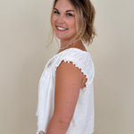 Hadleigh Smocked Neckline Blouse in white with tie neckline and flutter sleeves — Paper Doll