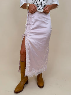 Sally Lace Trim Midi Skirt in lavender satin with scalloped lace side slit and bow ties — Paper Doll