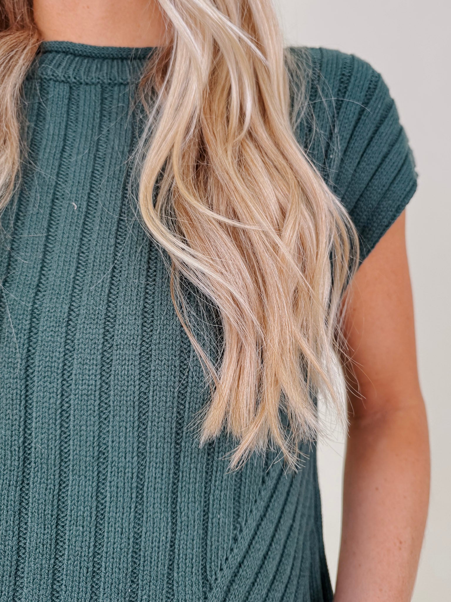 Miranda May Sweater Vest in dusty green ribbed knit with rolled crew neck — Paper Doll