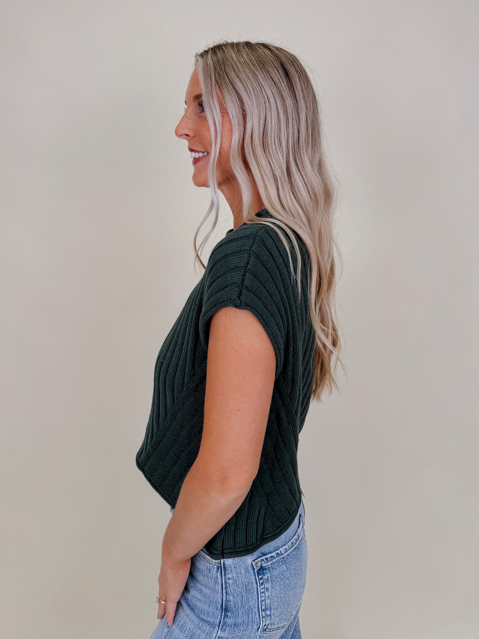 Miranda May Sweater Vest in dusty green ribbed knit with rolled crew neck — Paper Doll
