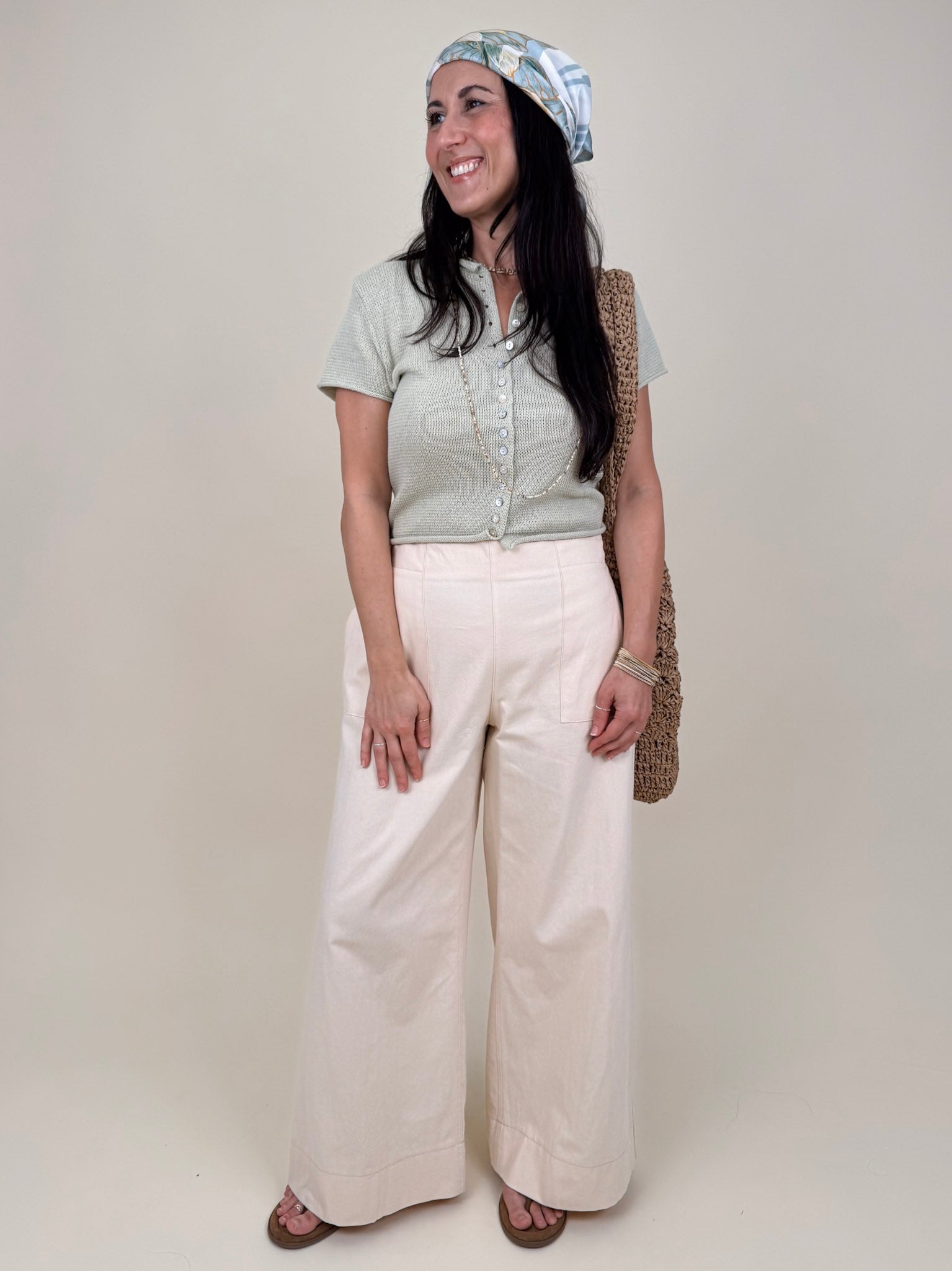 Stay Cool Sweater Top with pearl button front closure and short sleeve knit silhouette — Paper Doll