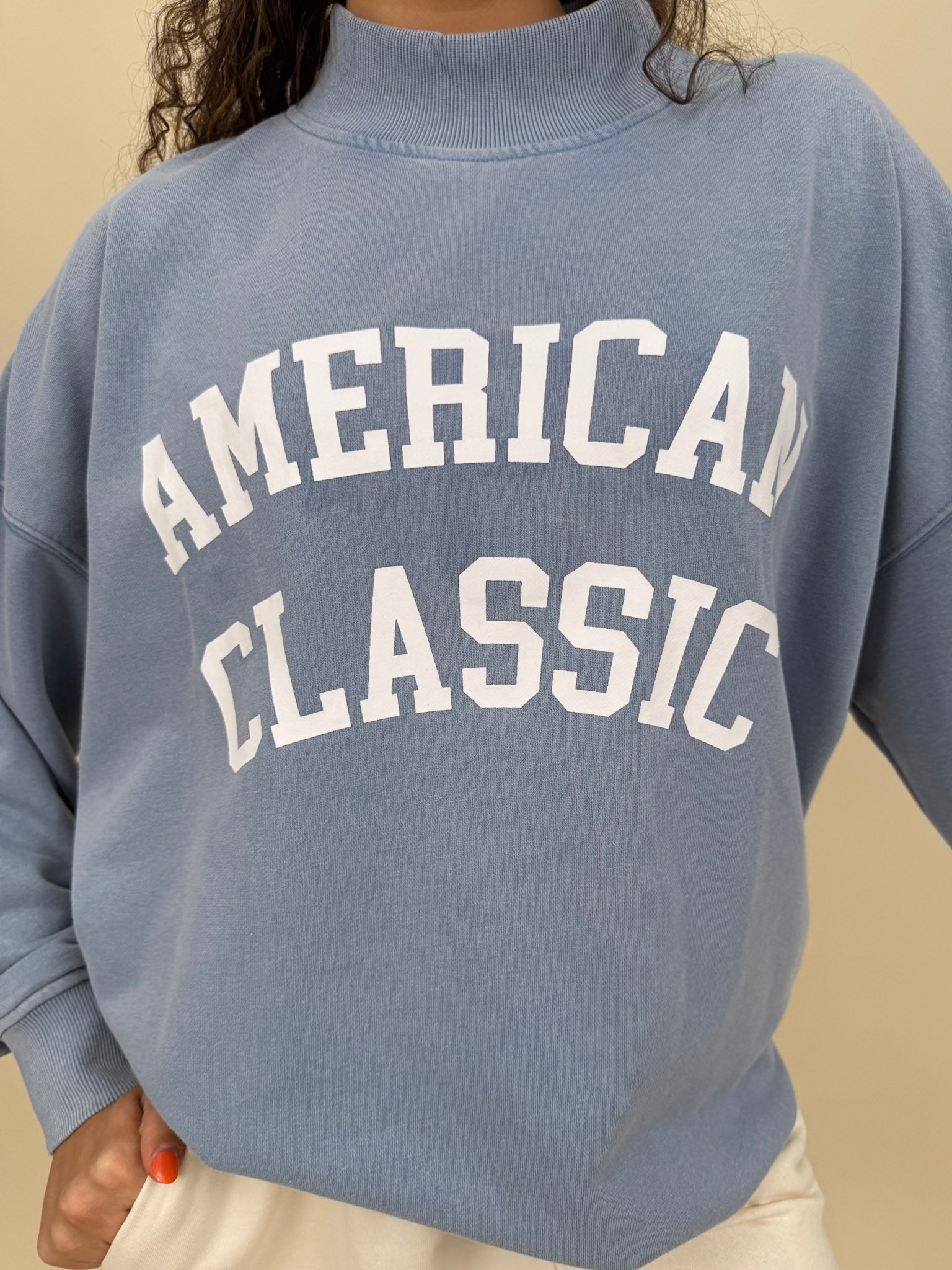 "American Classic" Reversible Sweater in light blue with varsity graphic and mock neck — Paper Doll
