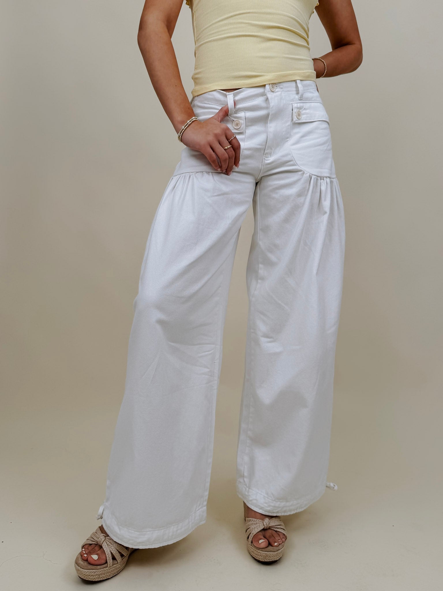 Lottie Boho Balloon Jean Pants in crisp white with cinch-tie balloon hem — Paper Doll
