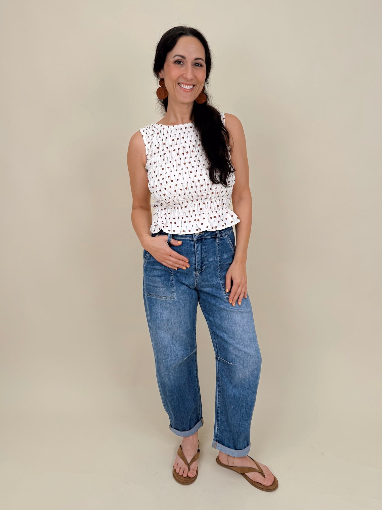 Talia Polka Dot Blouse in cream with brown polka dots and smocked peplum hem — Paper Doll