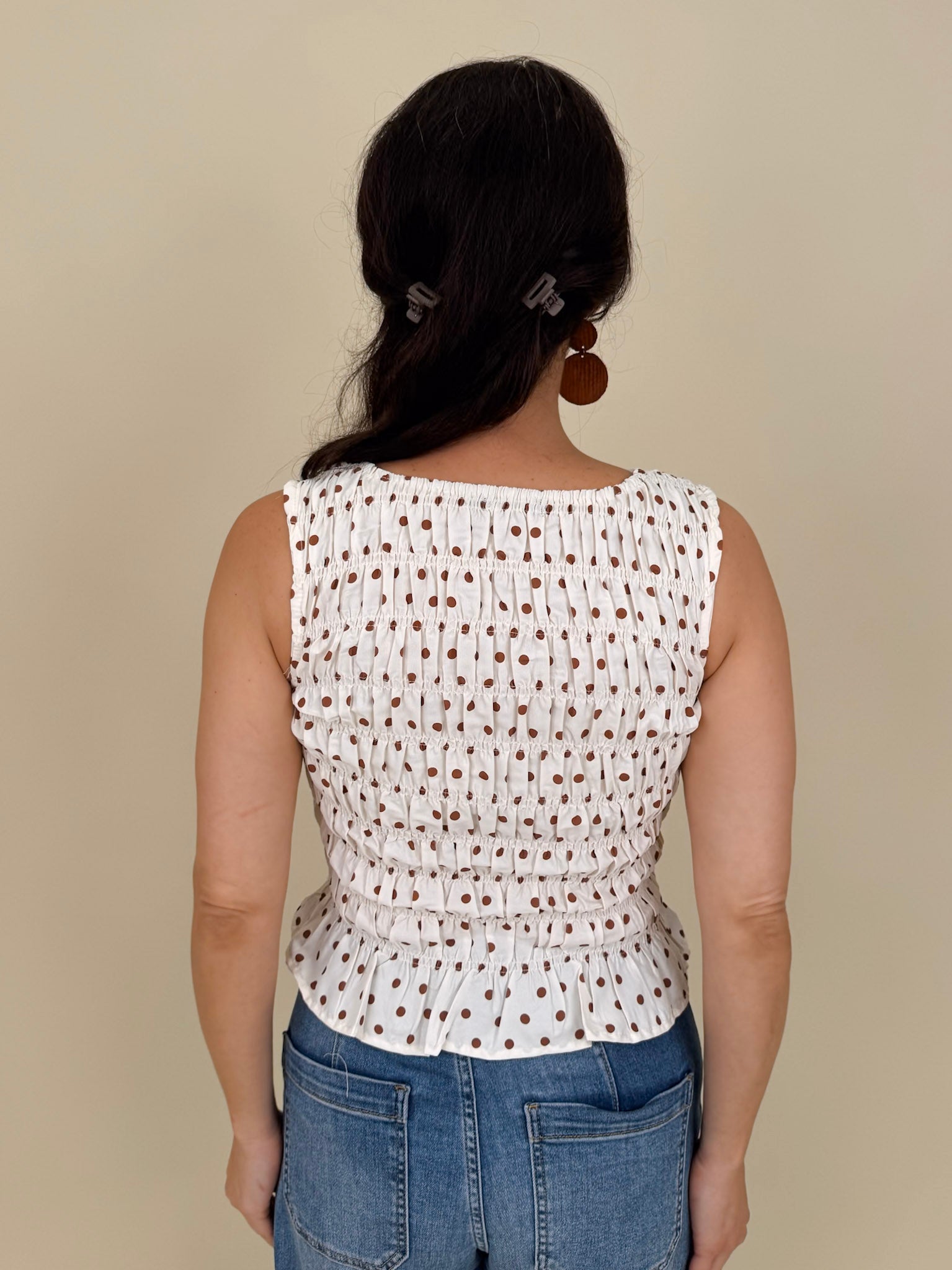 Talia Polka Dot Blouse in cream with brown polka dots and smocked peplum hem — Paper Doll