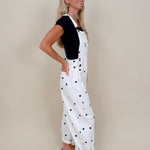 Brooke Polka Dot Overalls in cream denim with navy polka dot print and brass hardware — Paper Doll