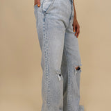 Christina Jeans in light acid wash with wide leg silhouette and distressed knee cutouts — Paper Doll