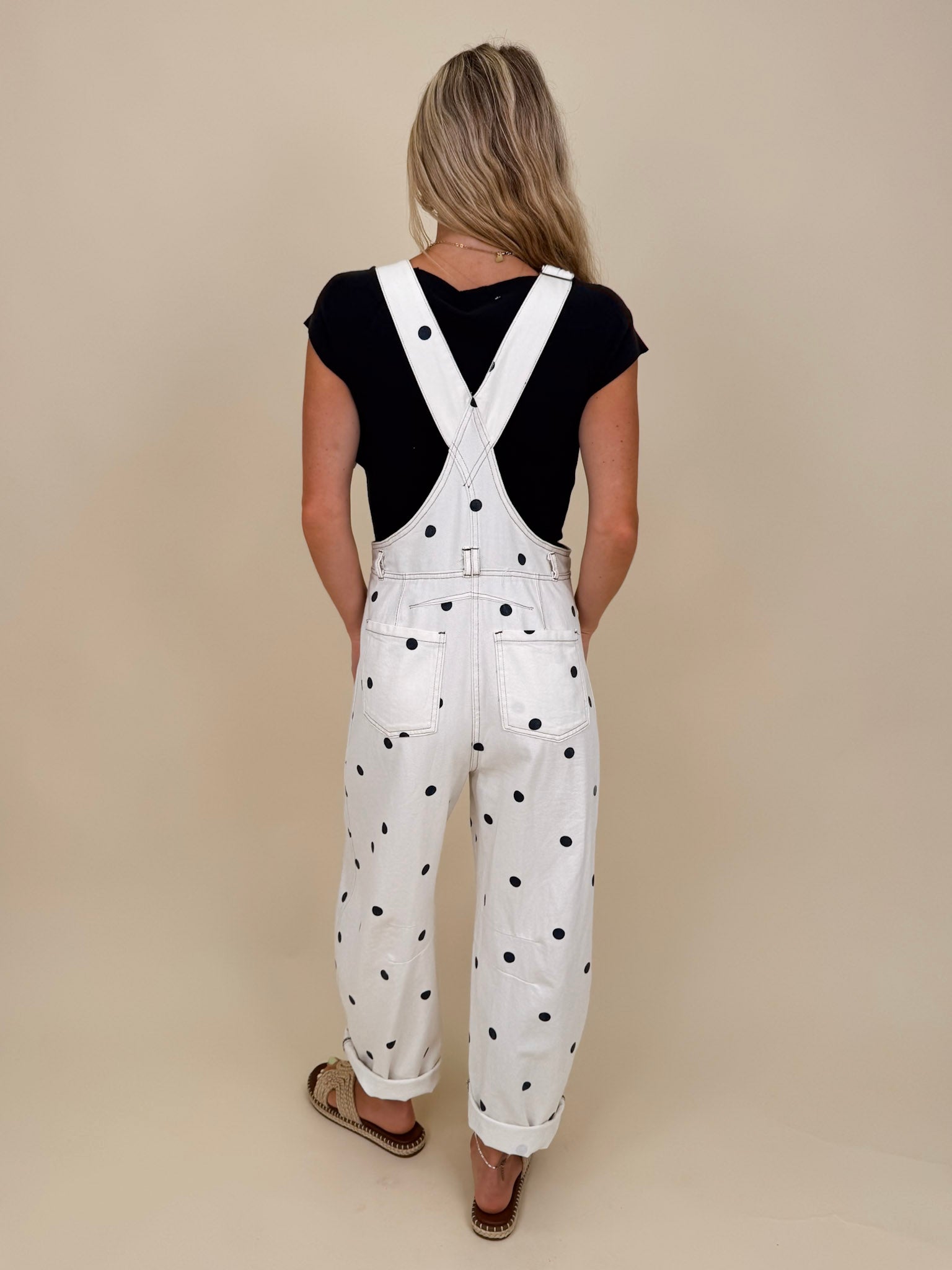 Brooke Polka Dot Overalls in cream denim with navy polka dot print and brass hardware — Paper Doll