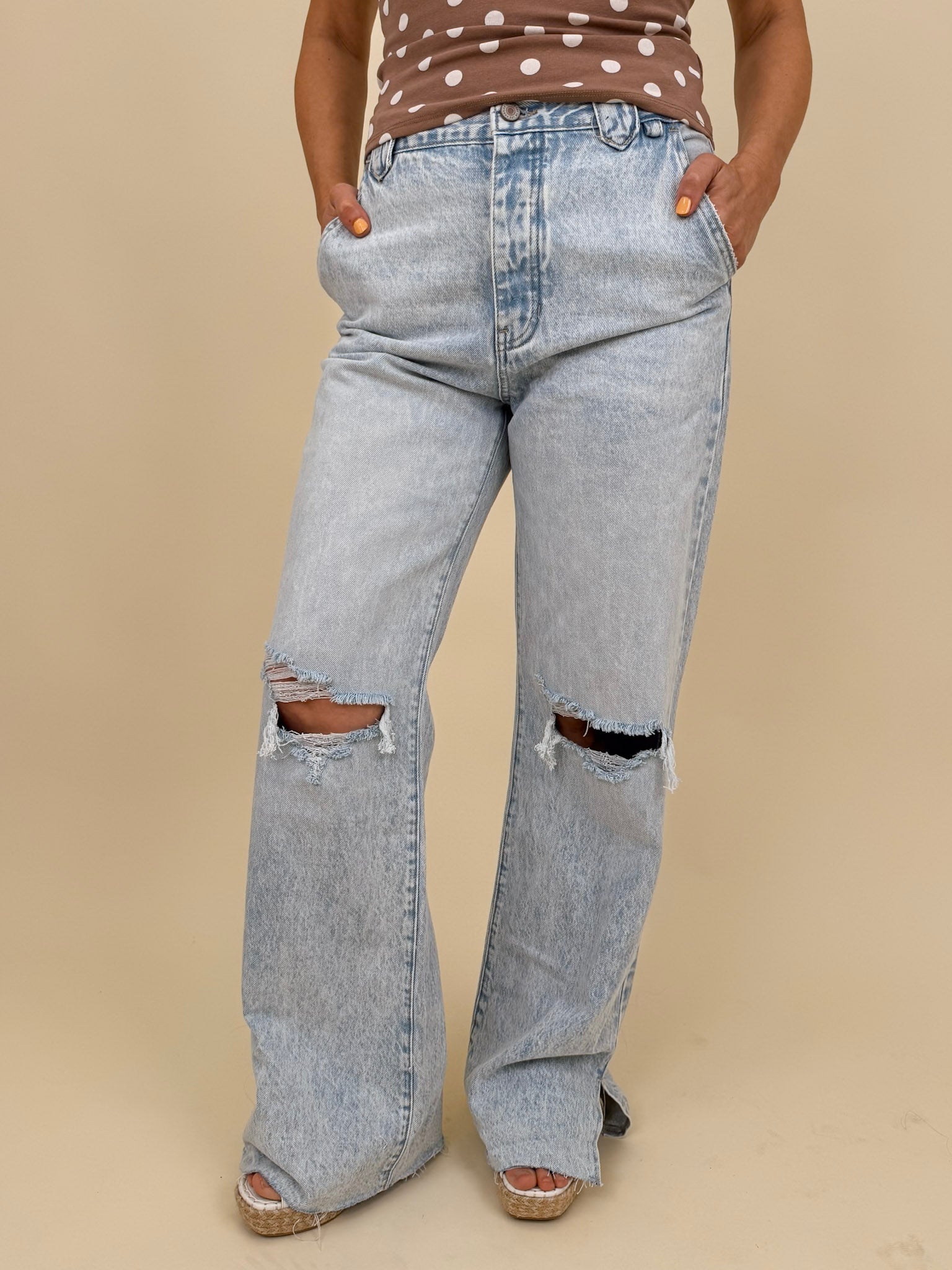 Christina Jeans in light acid wash with wide leg silhouette and distressed knee cutouts — Paper Doll