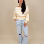 Christina Jeans in light acid wash with wide leg silhouette and distressed knee cutouts — Paper Doll