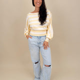 Christina Jeans in light acid wash with wide leg silhouette and distressed knee cutouts — Paper Doll
