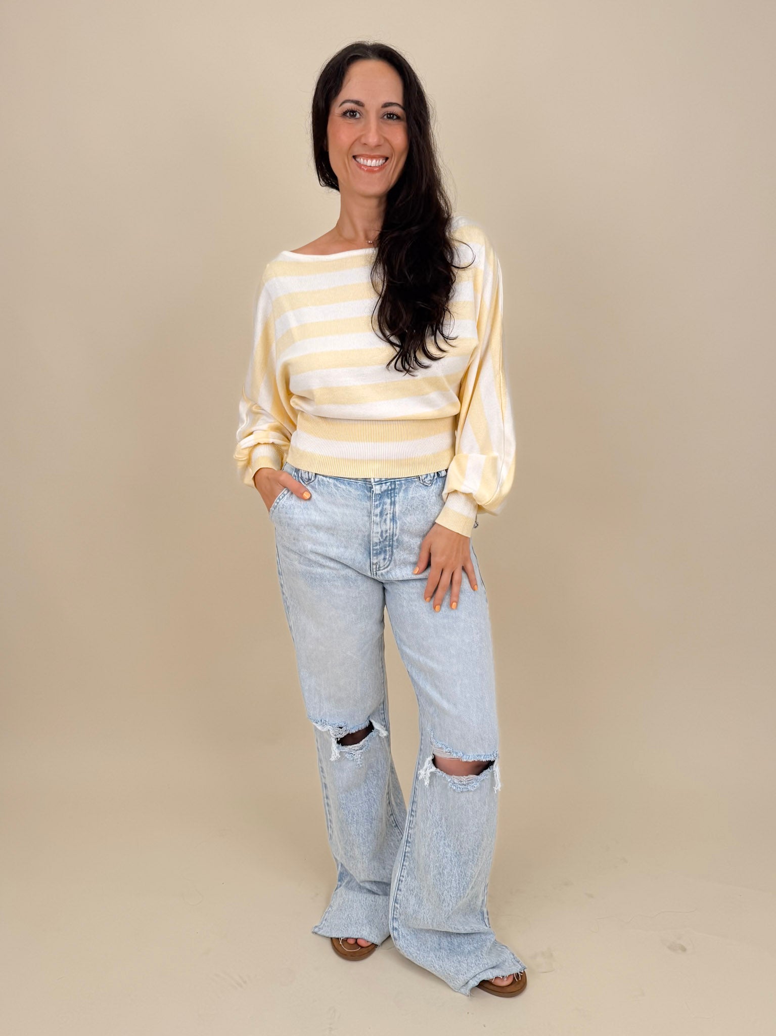 Christina Jeans in light acid wash with wide leg silhouette and distressed knee cutouts — Paper Doll