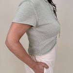 Stay Cool Sweater Top with pearl button front closure and short sleeve knit silhouette — Paper Doll
