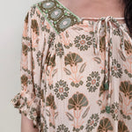 Kace Floral Boho Blouse in cream botanical print with embroidered yoke and smocked ruffle sleeves — Paper Doll
