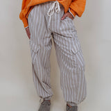 Betsy Wide-Leg Cargo Pant in oatmeal and cream stripe with flap cargo pockets and gathered ankle — Paper Doll