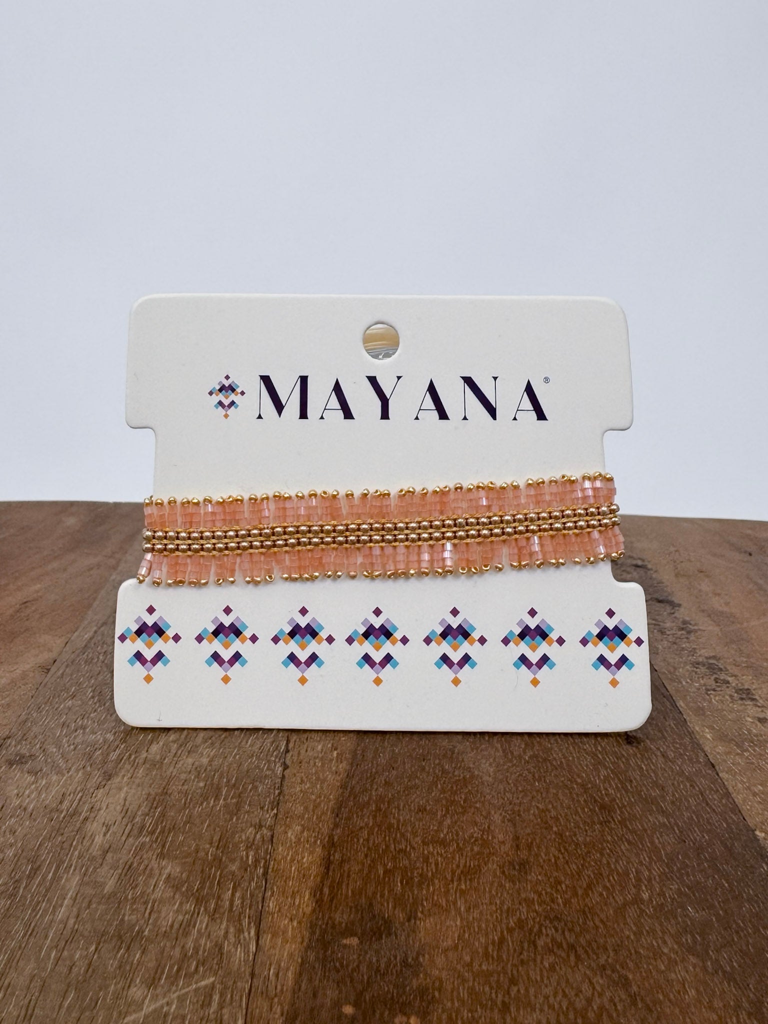 Handwoven Beaded Noor Bracelet in soft pink and gold with fringed beadwork — Paper Doll
