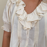 Dani Ruffle Blouse with cream ruffle neckline and pintuck detailing — Paper Doll
