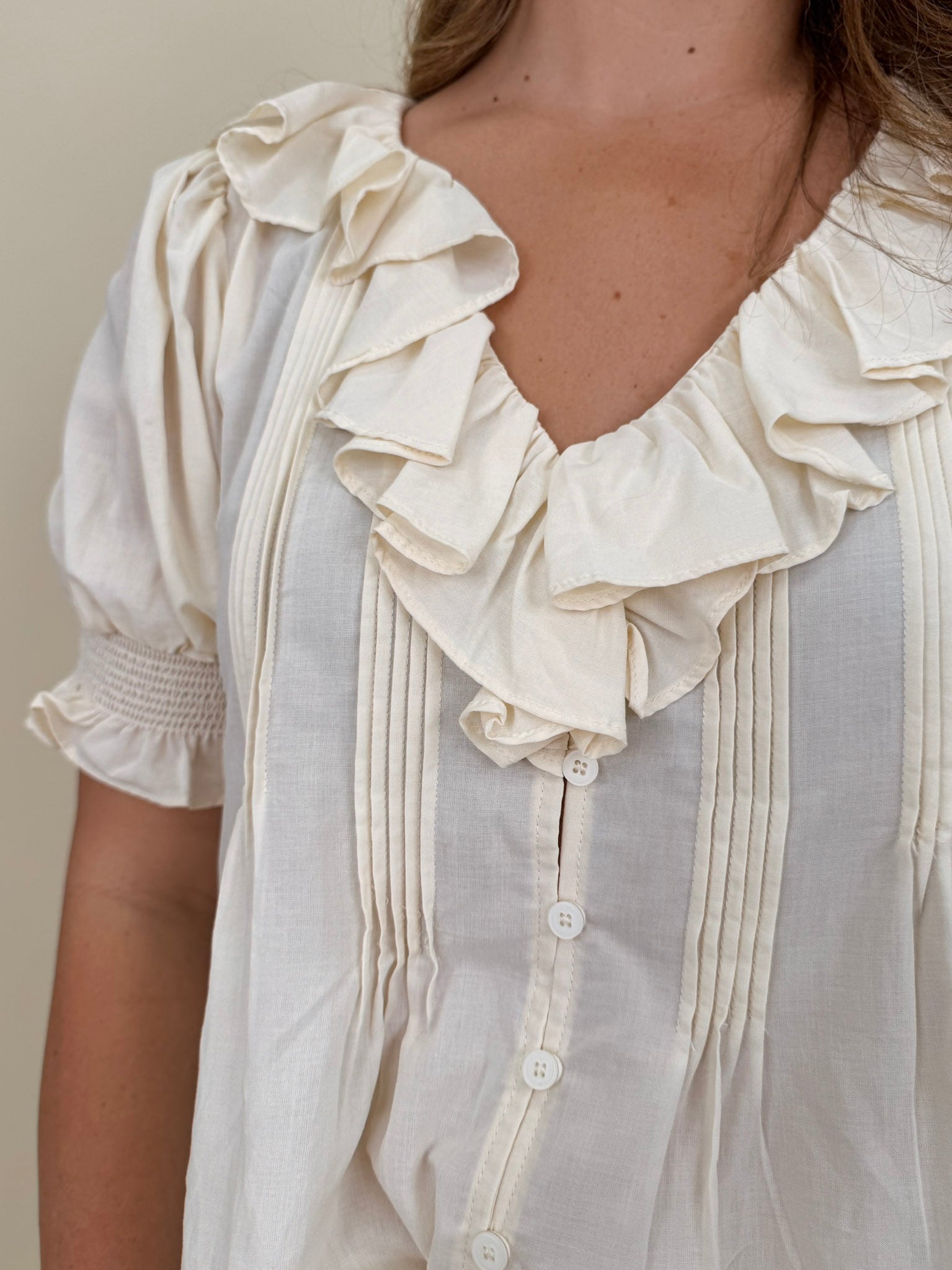 Dani Ruffle Blouse with cream ruffle neckline and pintuck detailing — Paper Doll