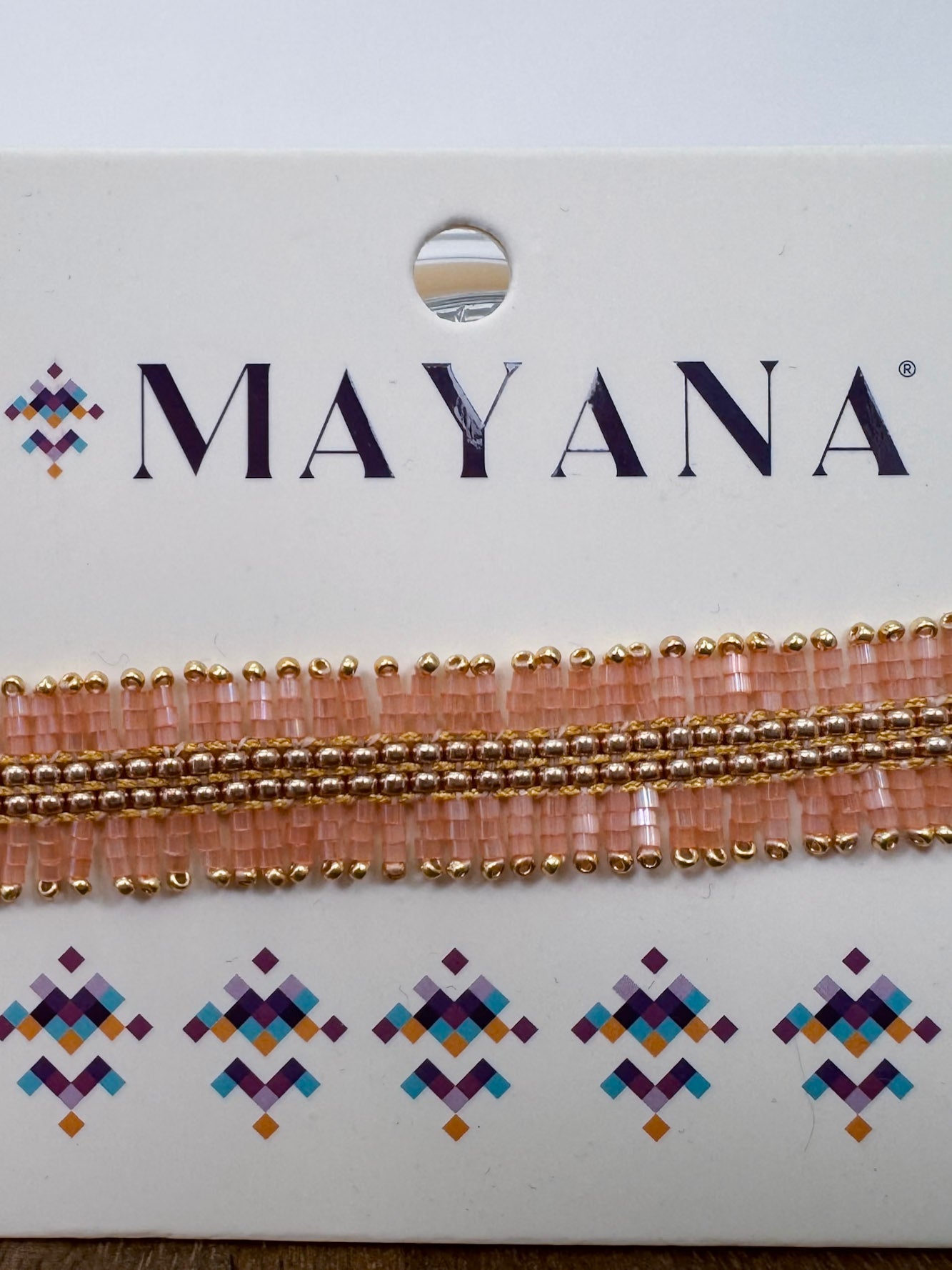 Handwoven Beaded Noor Bracelet in soft pink and gold with fringed beadwork — Paper Doll
