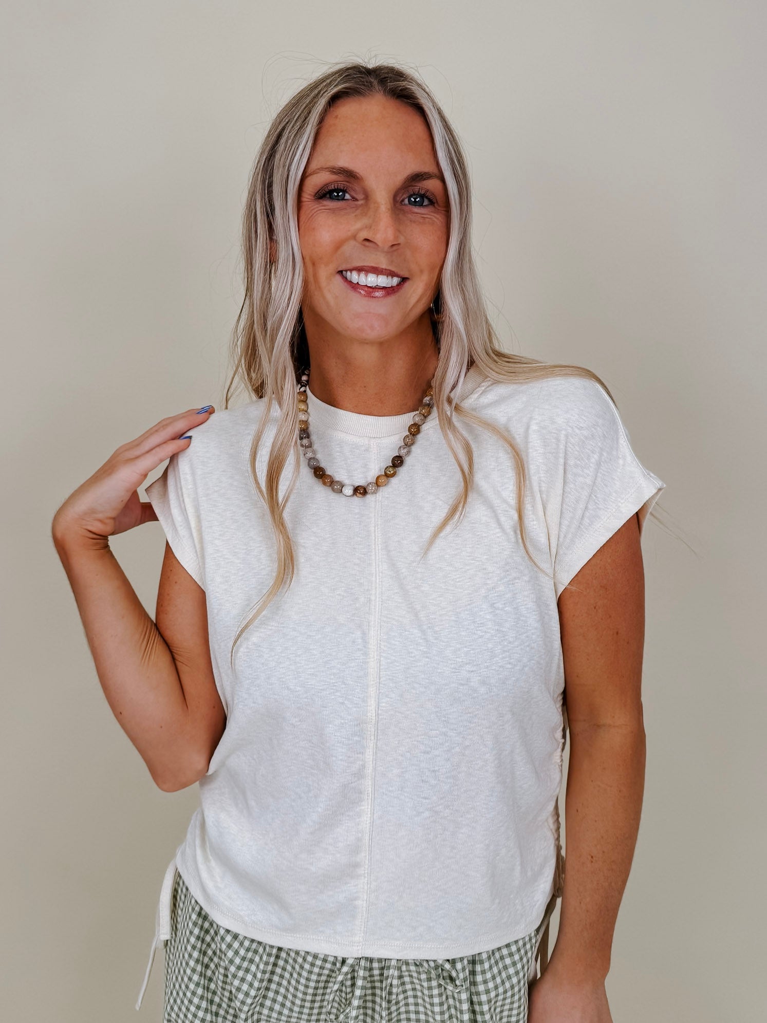 Simple Day Ruched Side Tie Blouse in ivory slub knit with cap sleeves and side ties — Paper Doll