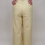 Chrissy Pant in yellow mist with high-rise waist, exposed button fly, and wide-leg silhouette — Paper Doll
