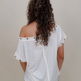 Just A Dream Metal Circle Trim Top in cream with metal grommet neckline trim — Paper Doll
