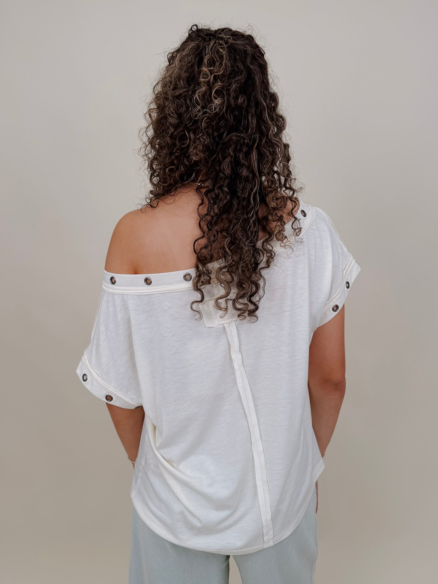 Just A Dream Metal Circle Trim Top in cream with metal grommet neckline trim — Paper Doll
