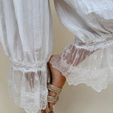 Charlotte Drapery Lace Trim Pants in ivory with gathered balloon leg and floral lace scallop hem — Paper Doll