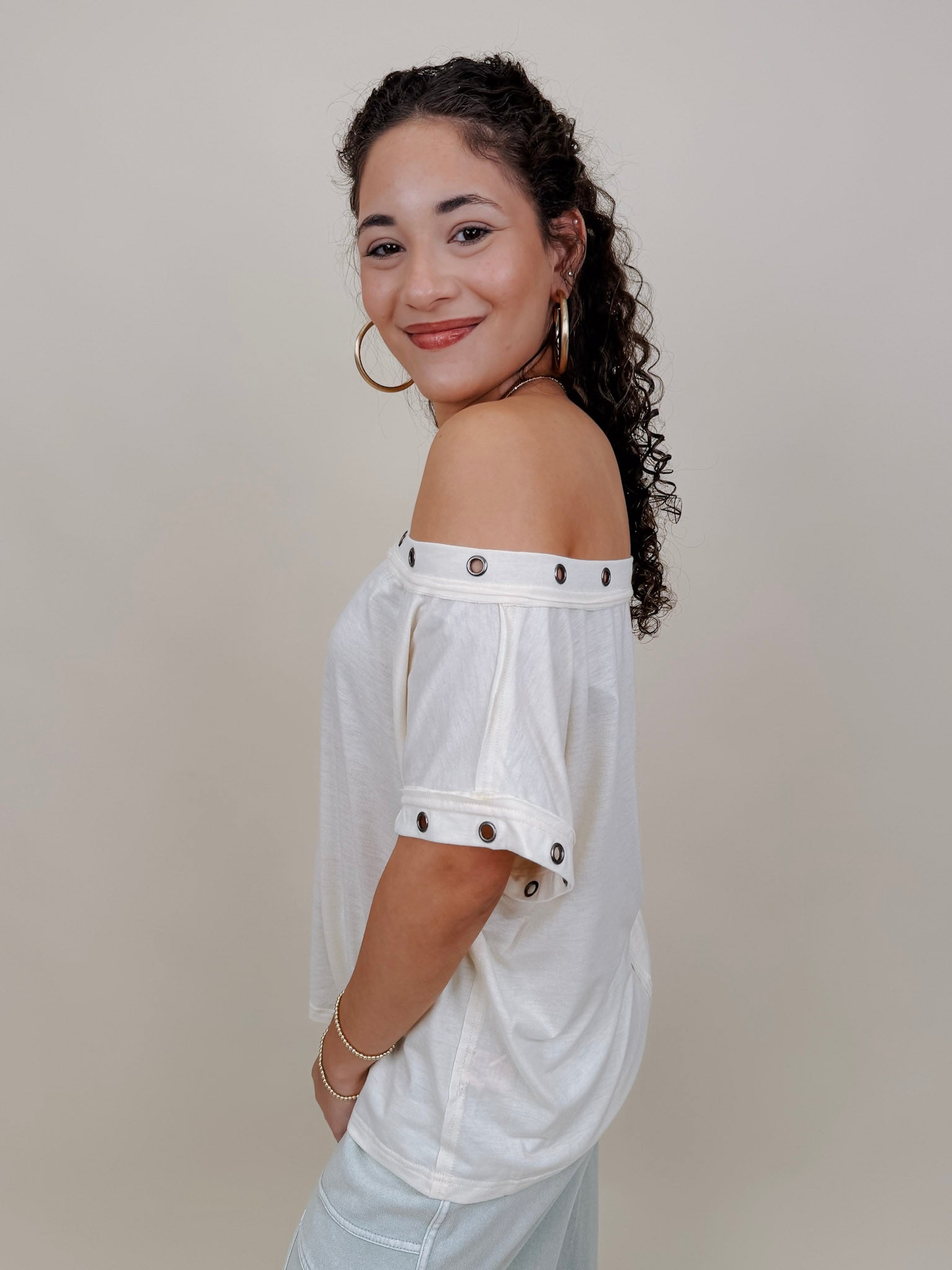 Just A Dream Metal Circle Trim Top in cream with metal grommet neckline trim — Paper Doll
