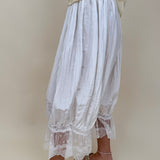 Charlotte Drapery Lace Trim Pants in ivory with gathered balloon leg and floral lace scallop hem — Paper Doll