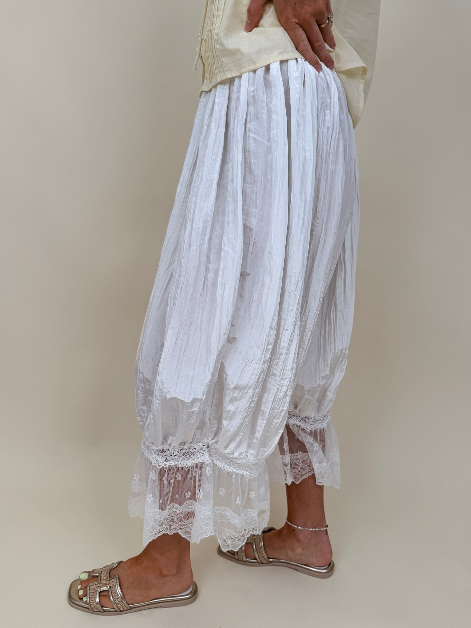 Charlotte Drapery Lace Trim Pants in ivory with gathered balloon leg and floral lace scallop hem — Paper Doll