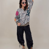 Cozy Jungle Hoodie in washed grey camo with stitched flower appliqués — Paper Doll