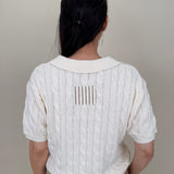 Take Heart Cable Knit Polo Shirt in cream with polo collar and contrast stripe placket — Paper Doll
