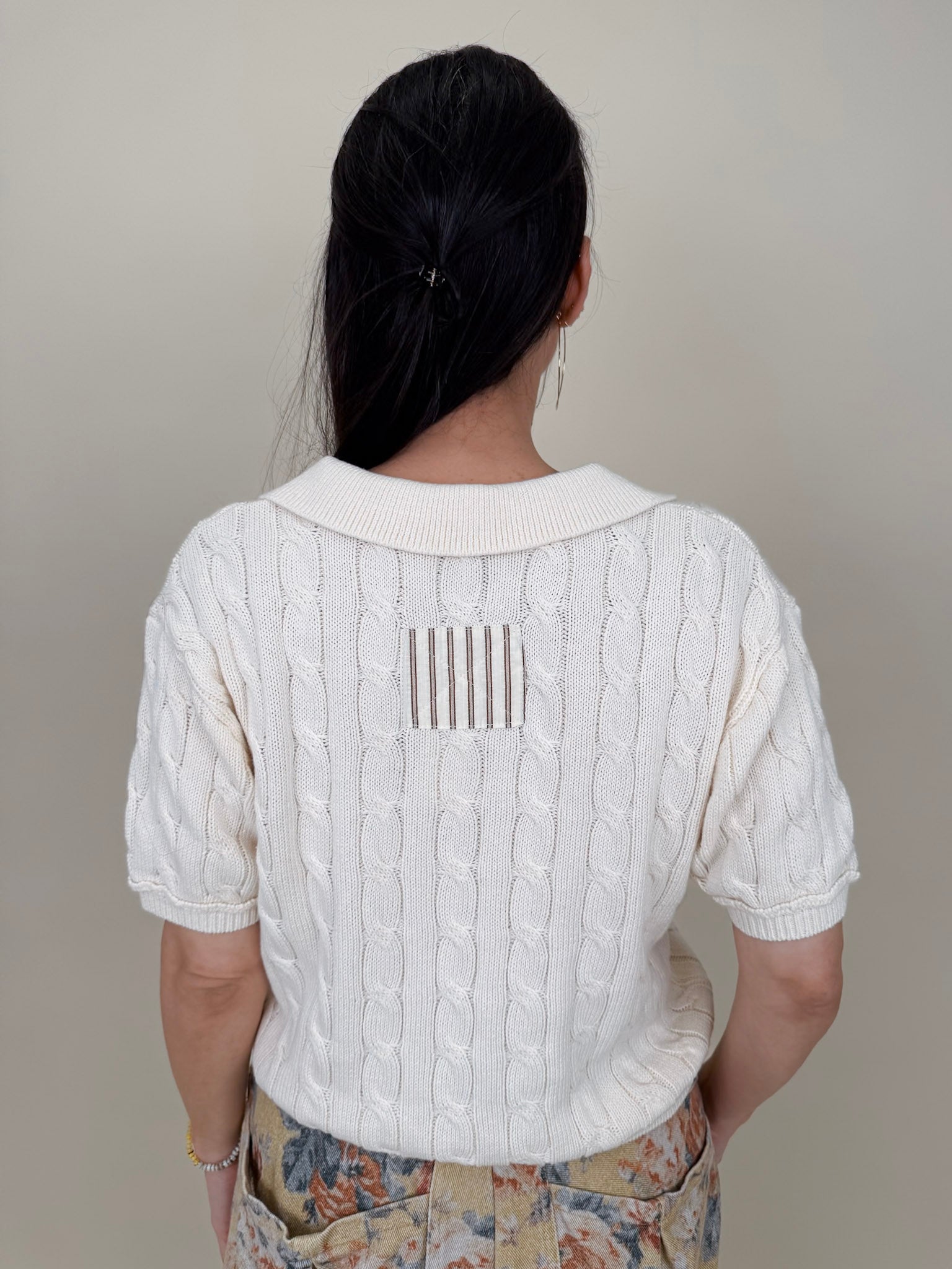 Take Heart Cable Knit Polo Shirt in cream with polo collar and contrast stripe placket — Paper Doll
