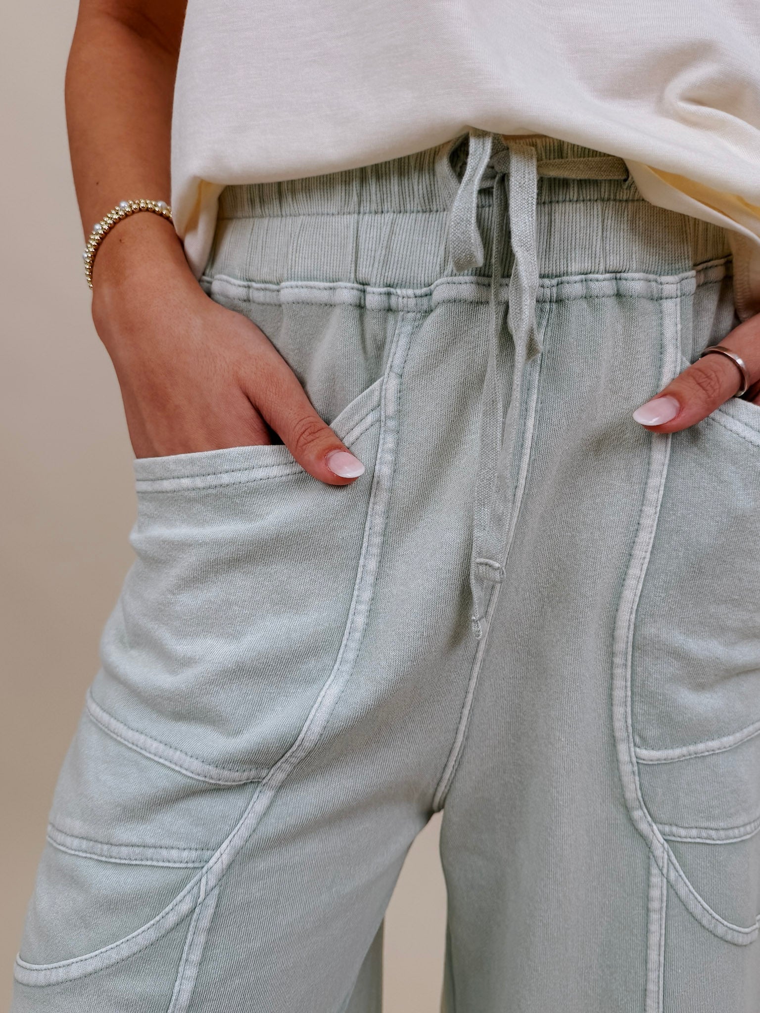Braxton Cozy Pant in washed sage with a drawstring waist and wide leg — Paper Doll
