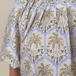 Palm Breeze Blouse in cream with olive and lavender palm tree print and puff sleeves — Paper Doll
