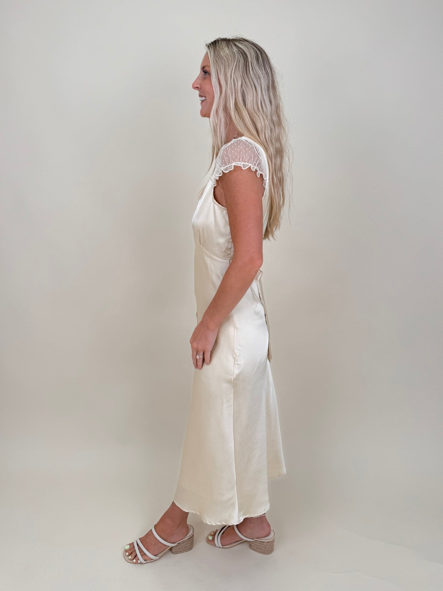 Isadora Satin Midi Dress in light yellow with lace trim and mesh flutter sleeves — Paper Doll