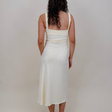 Serene Midi Dress in butter yellow with a sweetheart neck and body-skimming midi silhouette — Paper Doll
