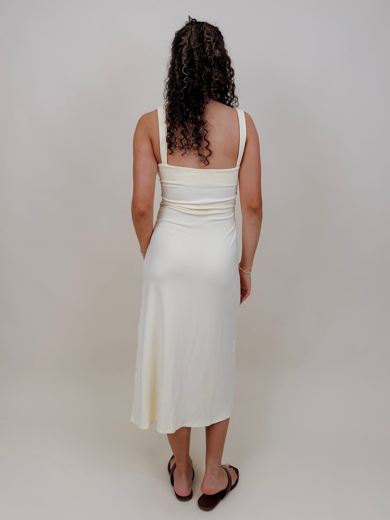 Serene Midi Dress in butter yellow with a sweetheart neck and body-skimming midi silhouette — Paper Doll
