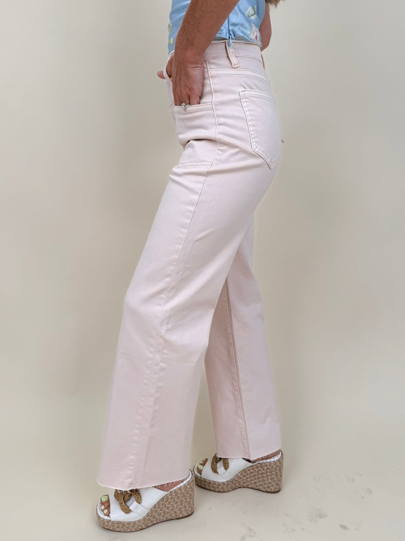 Colby Wide Leg Jean in blush pink with angled front pocket detail and raw ankle hem — Paper Doll