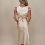 Isadora Satin Midi Dress in light yellow with lace trim and mesh flutter sleeves — Paper Doll