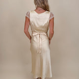 Isadora Satin Midi Dress in light yellow with lace trim and mesh flutter sleeves — Paper Doll