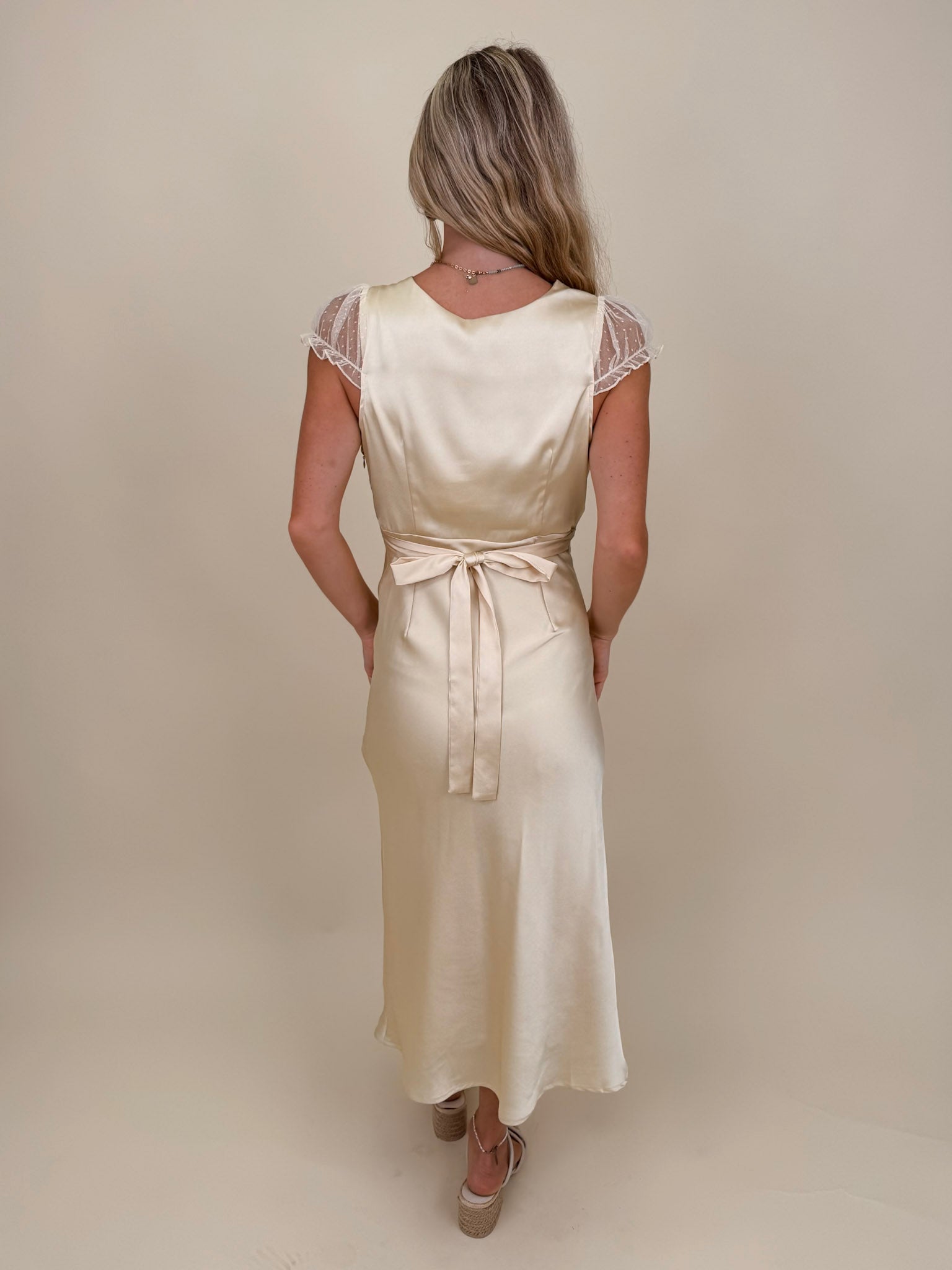 Isadora Satin Midi Dress in light yellow with lace trim and mesh flutter sleeves — Paper Doll