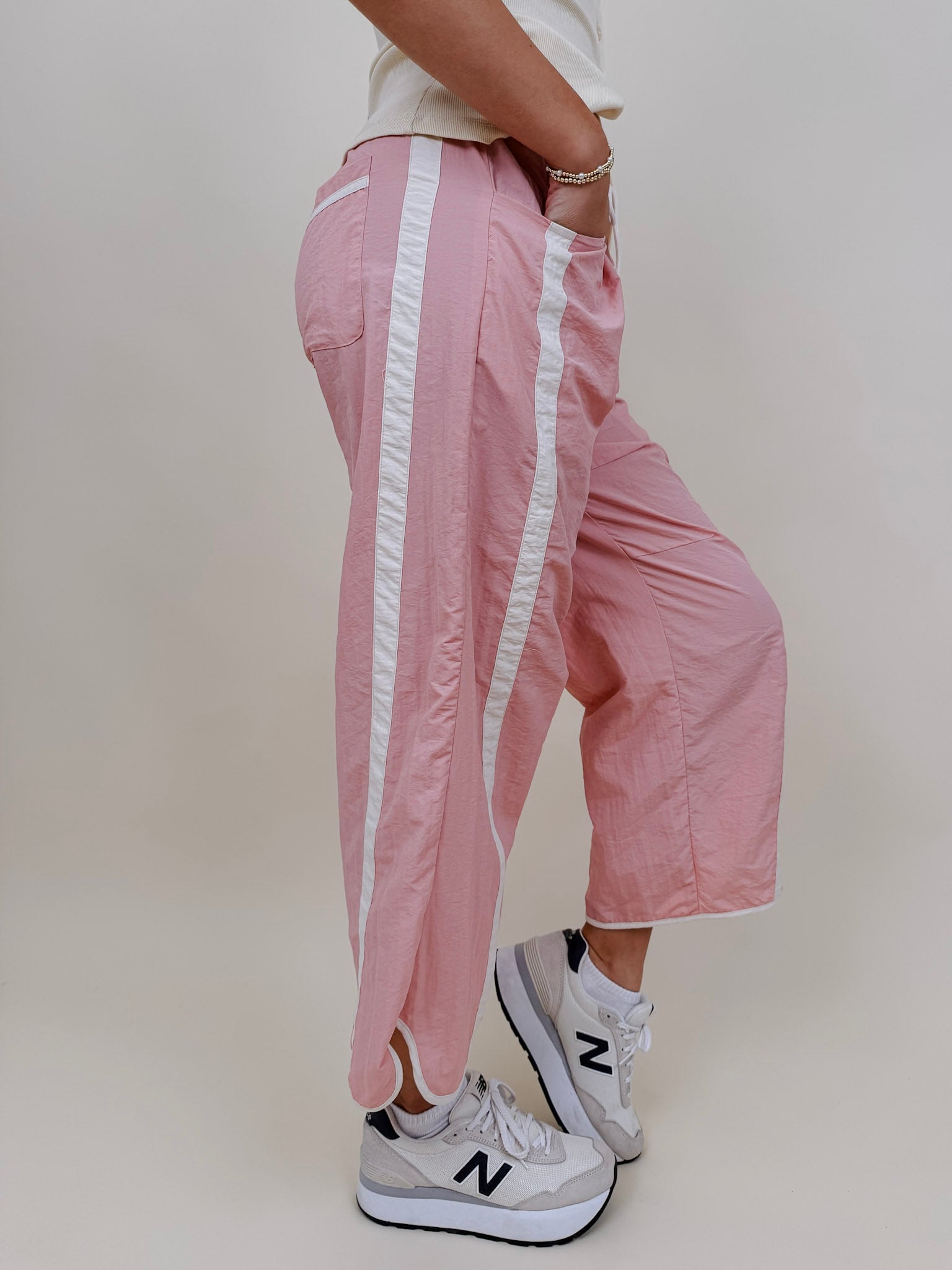 Run The Mile Pants in pink with white side stripe and drawstring waist — Paper Doll
