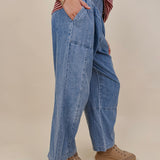 Annie Denim Casual Pants in light wash denim with smocked waist and barrel leg — Paper Doll