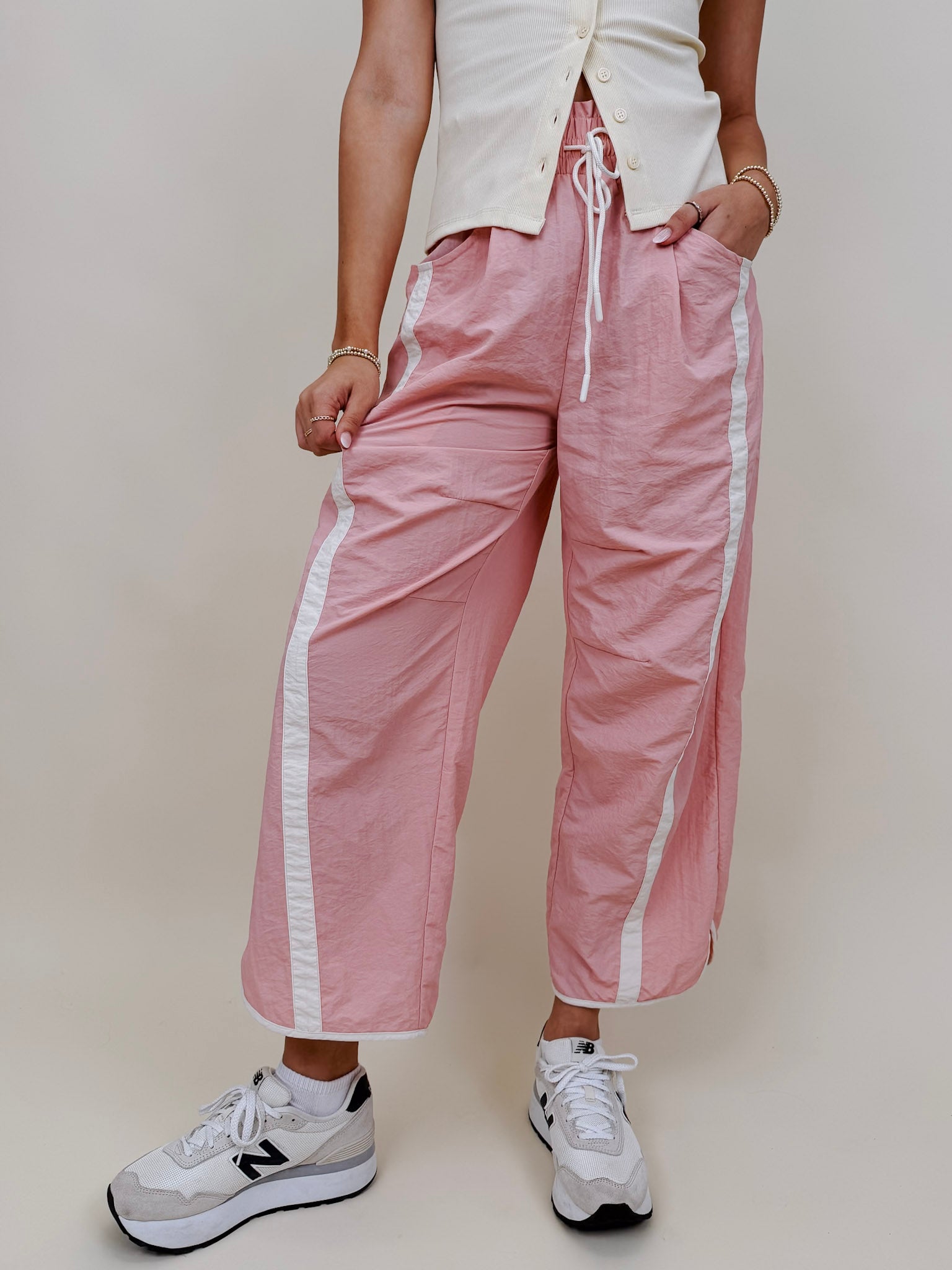 Run The Mile Pants in pink with white side stripe and drawstring waist — Paper Doll

