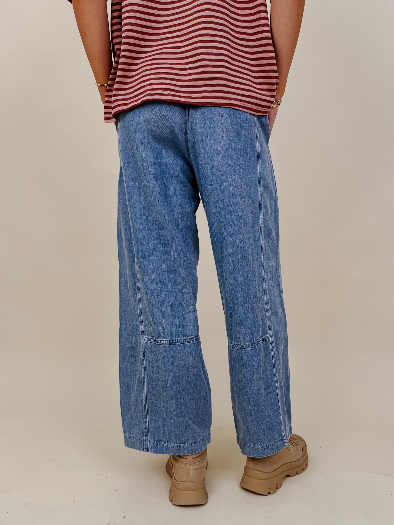 Annie Denim Casual Pants in light wash denim with smocked waist and barrel leg — Paper Doll